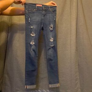 These are low waisted jeans . Dark blue